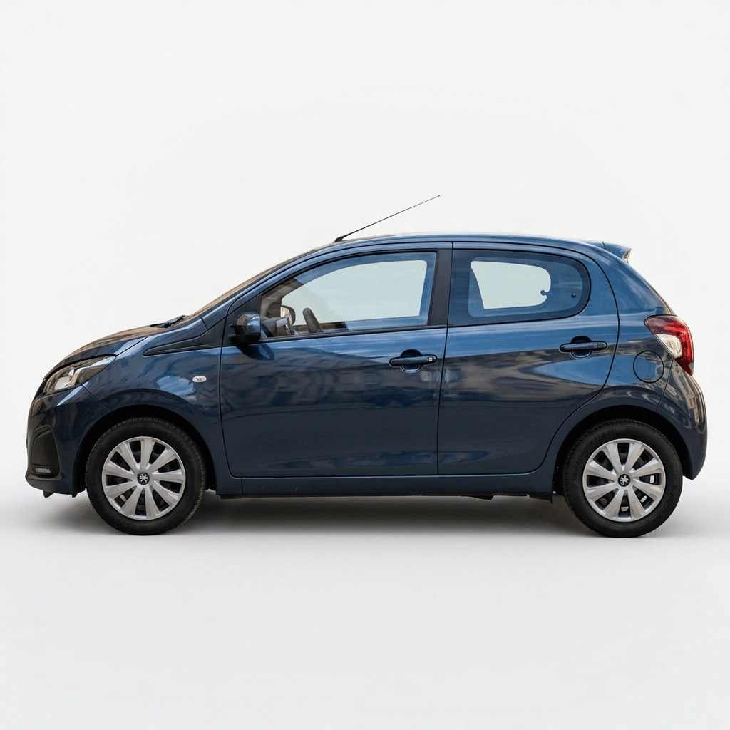 Blue compact hatchback car parked on cobblestone street with beige buildings